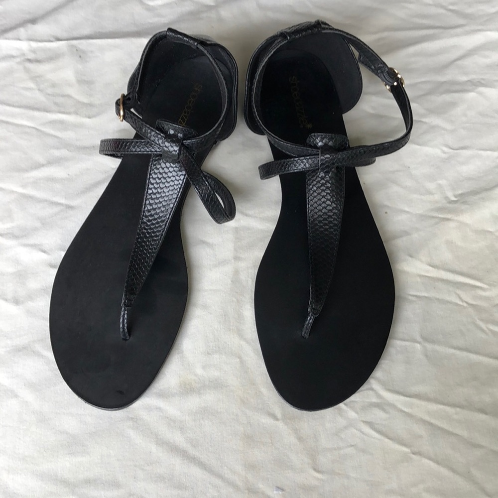 Black faux  snake skin thongs. Size 12.